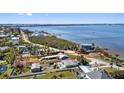 Waterfront property highlighted showing proximity to the bay with pier access at 1815 Palma Sola Blvd, Bradenton, FL 34209