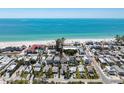 Charming coastal community featuring a beautiful beach and many homes near the ocean at 2714 Avenue C, Holmes Beach, FL 34217