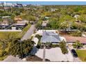 An aerial view of the house and lot with its white crushed shell driveway at 2105 Hibiscus St, Sarasota, FL 34239