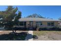 Single-story home with a well-maintained front yard and inviting entrance at 3808 118Th W St, Bradenton, FL 34210