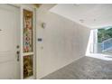 Welcoming condo entrance with coastal decor, leading to a bright and inviting interior space at 7910 34Th W Ave # 203, Bradenton, FL 34209