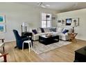 Bright living room featuring a comfortable sectional sofa and stylish decor at 11371 Perico Isle Cir, Bradenton, FL 34209