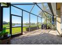 Spacious screened patio offering beautiful lake views at 12140 Whisper Lake Dr, Bradenton, FL 34211