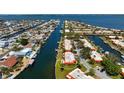 Beautiful aerial view of waterfront homes, illustrating the ease of boating and the tranquil canal lifestyle at 4216 El Dorado Cv, Bradenton, FL 34210