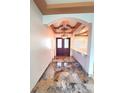 Inviting entryway featuring elegant lighting and decorative tile flooring at 5714 38Th E Ave, Bradenton, FL 34208