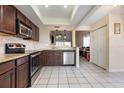 Updated kitchen with stainless steel appliances and granite countertops at 5753 Summer Side Ln # 8A, Sarasota, FL 34231