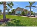 Charming single-story home with a well-manicured lawn and neat landscaping at 604 166Th E St, Bradenton, FL 34212