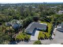 Aerial view of the property showing the surrounding community and location at 749 Tropical Cir, Sarasota, FL 34242