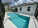 A gorgeous screened-in pool with modern design invites relaxation and enjoyment at 10006 Degas Ter, Bradenton, FL 34212