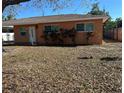 Charming single-story home with well-manicured landscaping and a freshly painted exterior at 1804 Bayshore Gardens Pkwy, Bradenton, FL 34207