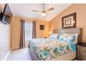 Cozy bedroom with vaulted ceiling and decorative bedding for added comfort at 2409 Gun Flint Trl, Palm Harbor, FL 34683