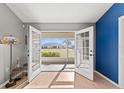 Tranquil view from the living room out to the screened lanai and backyard at 3605 60Th W St, Bradenton, FL 34209