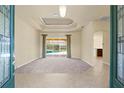 Bright and airy living room with access to a pool view and an open floor plan at 5270 White Ibis Dr, North Port, FL 34287