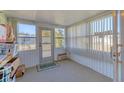 Bright Florida room with multiple windows offering ample natural light and scenic views at 1224 41St Avenue E Dr, Ellenton, FL 34222