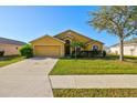 Inviting home featuring a lush front lawn and a two-car garage at 3503 14Th E Ct, Ellenton, FL 34222