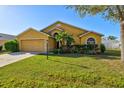 Attractive single-story home with a green lawn and mature trees at 3503 14Th E Ct, Ellenton, FL 34222