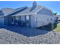 Charming single-story home with a well-maintained exterior, gray stucco, and a neatly graveled front yard at 3608 67Th Street Ct W, Bradenton, FL 34209