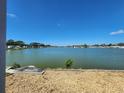 Beautiful view from the property overlooking a tranquil lake, offering a picturesque and relaxing environment at 808 53Rd E Ave # 273, Bradenton, FL 34203