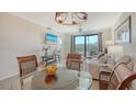 Inviting living room area with golf course view at 17510 Gawthrop Dr # 305, Bradenton, FL 34211