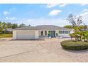 Charming single-story home with a well-manicured front yard and spacious driveway at 3611 22Nd W Ave, Bradenton, FL 34205