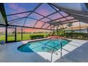 Relaxing screened-in pool area perfect for enjoying outdoor living and entertaining at 1511 Waterford Dr, Venice, FL 34292