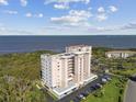 Breathtaking aerial view of a condominium complex with lush landscaping and waterfront views at 2625 Terra Ceia Bay Blvd # 506, Palmetto, FL 34221