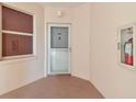 Welcoming condo entrance featuring unit number 506, and fire safety equipment at 2625 Terra Ceia Bay Blvd # 506, Palmetto, FL 34221