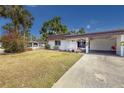 Charming home featuring a well-maintained lawn, carport, and inviting curb appeal in a desirable community at 3908 Panola Ln # 193, Sarasota, FL 34232