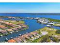 Stunning aerial view of a waterfront community with lush landscaping, private docks, and scenic waterways at 510 16Th E Ave, Palmetto, FL 34221