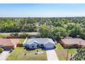 Birds eye view of a single Gathering home with fenced yard in a serene neighborhood at 5330 Alseir Rd, North Port, FL 34288