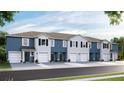 New townhomes featuring modern design, contrasting paint colors, and attached garages at 11830 Davis Dr, Largo, FL 33774