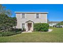 Charming two-story home with a manicured lawn and beautiful landscaping at 14747 Amberjack Ter, Lakewood Ranch, FL 34202