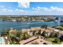 Waterfront condos feature lush landscaping, direct water access, and scenic views of the intercoastal waterway at 1900 Cove Ii Pl # 133, Sarasota, FL 34242