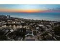 Panoramic aerial view of the coastal community near a tranquil bay at sunset at 4646 Gleason Ave, Sarasota, FL 34242