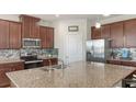 Lovely kitchen featuring stainless steel appliances, granite countertops, and plenty of cabinet space at 6105 114Th E Dr, Parrish, FL 34219