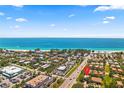 Beautiful aerial view of a neighborhood near the beach, showcasing the proximity to the ocean at 4002 6Th Ave, Holmes Beach, FL 34217