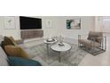 Cozy living room with stylish furniture, modern decor, and ample natural light at 4104 112Th E St, Palmetto, FL 34221