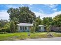 Charming single-story home features a well-maintained lawn, and a cozy facade at 617 26Th W St, Bradenton, FL 34205