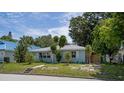 Charming single-story home features a well-maintained lawn, and a cozy facade at 617 26Th W St, Bradenton, FL 34205