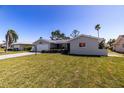 Charming single-story home with a well-manicured lawn and attached one car garage at 7307 14Th W Ave, Bradenton, FL 34209
