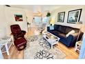 Inviting living room with hardwood floors, comfortable seating, and a bright, open layout at 1633 Leisure Dr # M-37, Bradenton, FL 34207