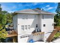 Spacious two-story home with a three-car garage and multiple decks for outdoor enjoyment at 2003 12Th W Ave, Bradenton, FL 34205