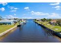 Stunning aerial view of the canal with houses and docks alongside the water, showcasing a waterfront community at 2523 Dixon Ter, Port Charlotte, FL 33981