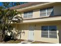 Charming exterior view of this two-story home with a well-kept facade and inviting curb appeal at 306 Barlow Ave # 77, Sarasota, FL 34232