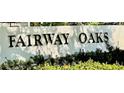 Fairway Oaks entrance sign surrounded by manicured landscaping showcasing a well-kept community at 306 Barlow Ave # 77, Sarasota, FL 34232