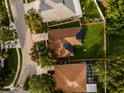 Aerial view of the property showcasing the home, yard, and surrounding neighborhood at 4706 Cayo Costa Pl, Bradenton, FL 34203