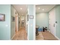 Hallway view with beautiful tile flooring and neutral paint throughout the home at 314 Bay S Dr # 5, Bradenton Beach, FL 34217