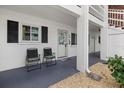 Charming front porch with seating and view of the well-maintained community at 1536 Leisure Dr # N4, Bradenton, FL 34207