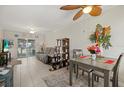 Relaxing living room featuring stylish decor, comfortable seating, and sliding door access at 1536 Leisure Dr # N4, Bradenton, FL 34207