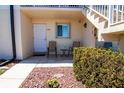 Condo entrance with chairs and small table at 25275 Rampart Blvd # 1203, Punta Gorda, FL 33983